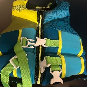 Worn Child:Infant/toddler life jacket.